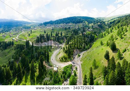 Beautiful Nature With Country Cottages And Traditional Wooden Houses On The Road Through The Goderdz