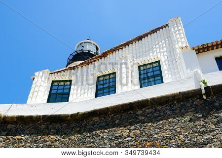 Farol Da Barra, Barra Lighthouse, In Salvador, Bahia, Brazil. The Historic Architecture Of Salvador 