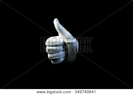A Hand Wearing White Glove On Black Background Showing Ok Sign