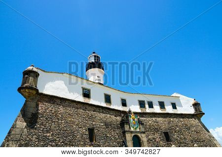 Farol Da Barra, Barra Lighthouse, In Salvador, Bahia, Brazil. The Historic Architecture Of Salvador 
