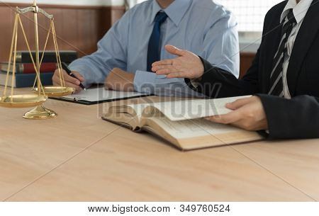 Lawyers Having Team Meeting In Law Firm. Concepts Of Law, Legal Services, Legislation.