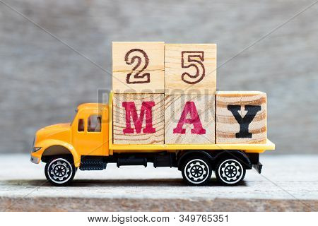 Truck Hold Letter Block In Word 25may On Wood Background (concept For Date 25 Month May)
