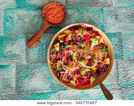 Fresh Salad Of Broccoli, Shredded Carrots, Apple, Red Cabbage, Beets, Radishes With Sesame Peanut Dr