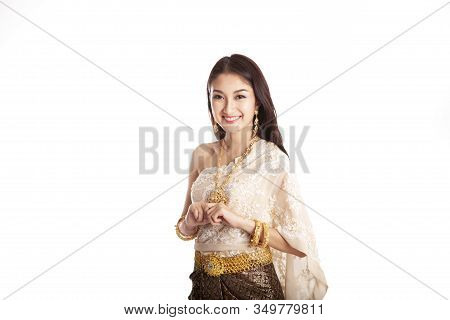 Asian Thai Beautiful Women Welcome With Traditional Thai Suit In Studio On White Background