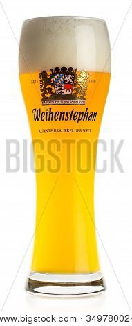 Groningen, Netherlands - February 06, 2020: Glass Of German Weihenstephaner Wheat Beer Isolated On A