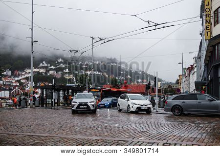 Editorial 09.04.2019 Bergen Norway Cars Turning To Østre Murallmenningen Street From Strandkaien Str