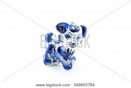 Ussia, Saransk January 25, 2020 Small Ceramic Dog White And Blue.
