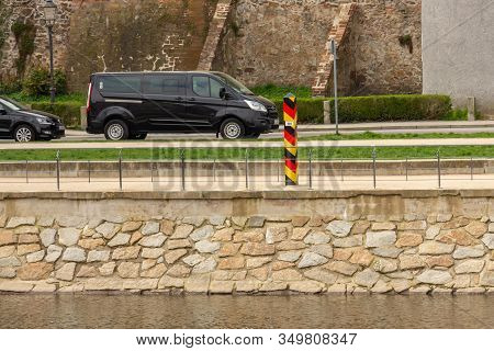 Gerlitz, Germany - April, 2019: German Border Pillar Near The Lusatian Neisse River That Dividing Th
