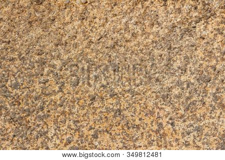 Texture Of A Yellow-gray Granite Stone, Original Background, Close-up