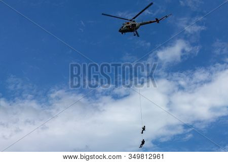 Arlamow, Poland - May, 2019: Evacuation Of Two Servicemen By Air And Takeoff Of Military Helicopter 