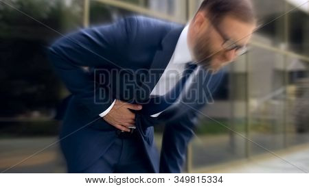 Businessman Suffers From Sharp Stomach Ache, Gastritis, Heartburn, Dizzy Effect