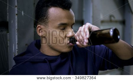 Guy Drinking Beer Trying To Calm Down Inner Pain And Depression, Teenage Years