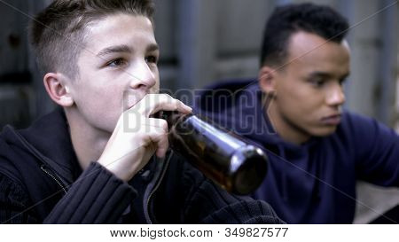 Problem Teenagers Secretly Drinking Beer, Skipping School Classes, Hooligans