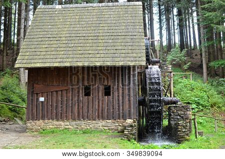 Old Wooden Water Mill With Mill-wheel Detail Photo