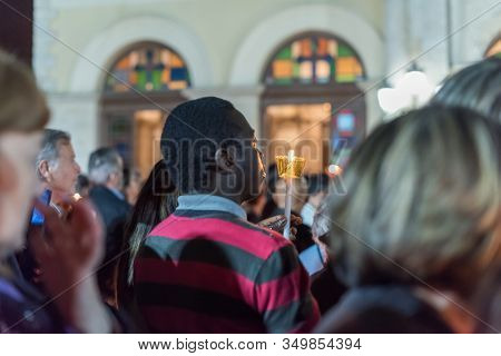 Heraklion, Crete, Greece - 28 April 2019: People Celebration With Lit Candles Easter Night Outside A