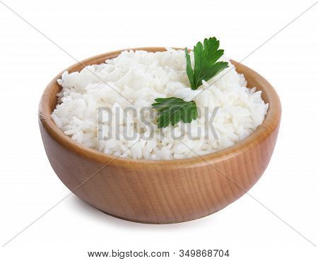 Wooden Bowl With Cooked Rice And Parsley Isolated On White