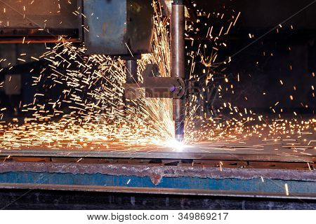 Plasma Cutting Of Metal With A Cnc. Plasma Cutting Machine Cutting Steel Sheet. Laser Cutter In Prod