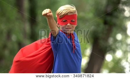 Superhero Boy Playing In Park, Pretending To Fly, Brave Child And Winner Concept