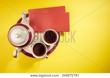Teapot and cups used in traditional Chinese wedding ceremony with chinese sign meaning happinese. Translation: Double Happiness