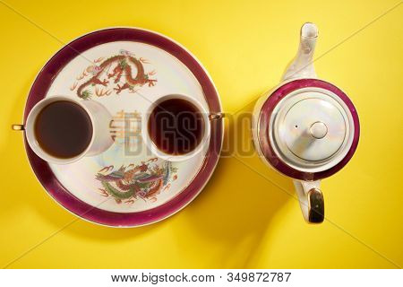 Teapot and cups used in traditional Chinese wedding ceremony with chinese sign meaning happinese. Translation: Double Happiness