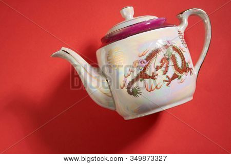 dragon and phoenix Teapot and cups used in traditional Chinese wedding ceremony with chinese sign meaning happinese. Translation: Double Happiness