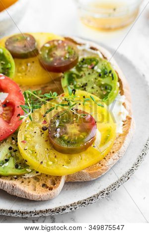 Italian Appetizer Friselle With Tomatoes, Cheese And Thyme. Italian Cuisine. Healthy Vegetarian Food