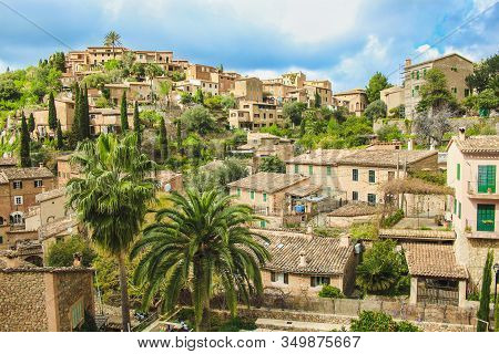 View Over Deia Town At The West Coast Of Mallorca, Spain