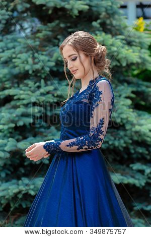 Close Up Portrait Of Beautiful Teen Girl In Beautiful Ultramarine Prom Dress Prom Dress. Glamorous H