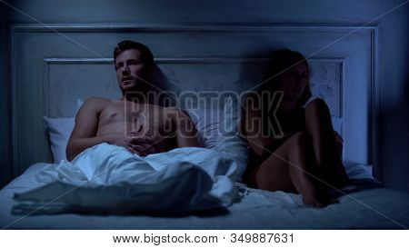 Unhappy Couple Having Conflict In Bed, Relations Difficulties, Misunderstanding