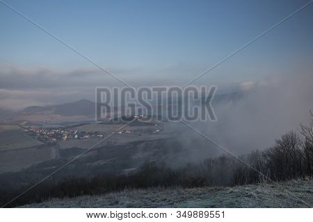Sunrise Time On Radobyl Hill Over Valley Of River Labe And Lovosice Town