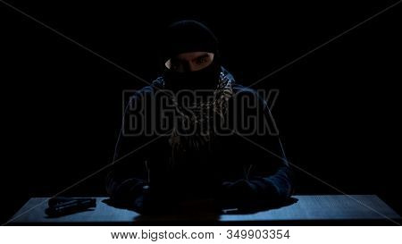 Dangerous Terrorist In Balaclava Looking Into Camera, Terrorism As Global Threat