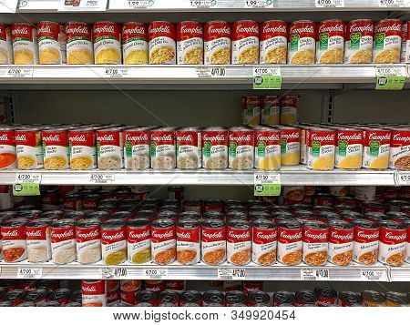 Orlando, Fl/usa-2/6/20: The Campbells Soup Aisle At A Publix Grocery Store With A Variety Of Campbel