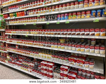 Orlando, Fl/usa-2/6/20: The Campbells Soup Aisle At A Publix Grocery Store With A Variety Of Campbel