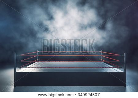 Empty Boxing Ring In Foggy Interior. Sport And Challenge Concept. 3d Rendering