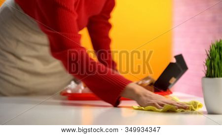 Waitress Wiping Table After Customers In Fast Food Restaurant, Part-time Job