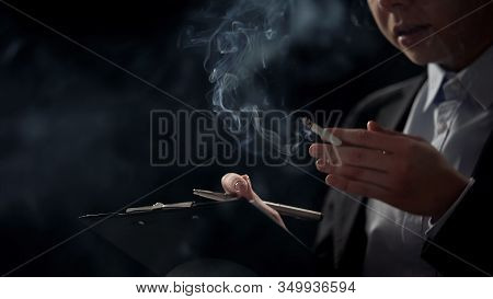 Businessperson Smoking Cigarette And Filling Documents, Stressful Job, Overwork