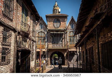 Gonzalez Catan, Argentina, September 28, 2019: People Walking Along Cobblestone Path Through Abandon