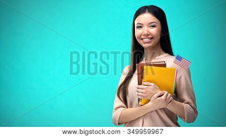 Cheerful Woman Holding Usa Flag Book, Education Abroad, Learning Language