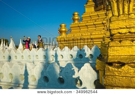 Mandalay, Myanmar - January 7, 2019: Chinese tourists at Sanda Muni Pagoda