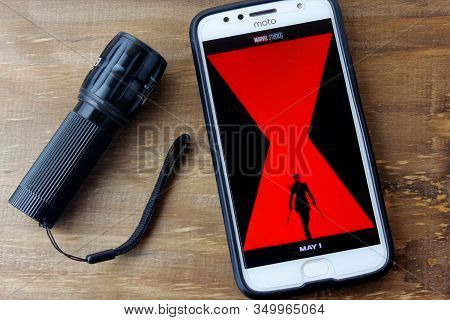 Rio De Janeiro, Brazil - February 9, 2020: Black Widow Movie Logo On The Moto G5s Plus Phone Screen.