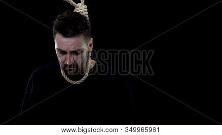 Disappointed Man In Rope Noose On Black Background, Life Crisis, Depression