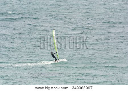 Windsurfing On The Background Of The Sea