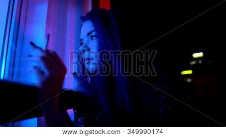 Drunk Woman Looking Through Window With Cigarette At Balcony, Inflammation Risk