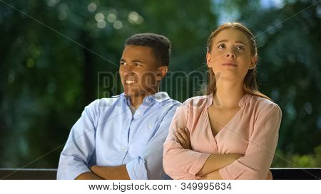 Offended Girl Sitting With Folded Hands, Boy Shocked With Her Whims, Conflict