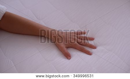 Hand Touching Mattress, Testing Elasticity And Durability, Quality Sleep Closeup