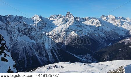 Aerial View Of The Dombai Mountains And Belalakaya Peak, A Region Of Mountains In The North Caucasus