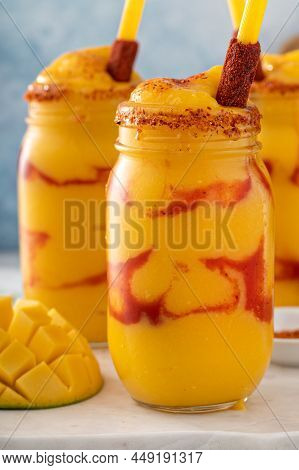 Mangonada Mexican Mango Smoothie With Chamoy Sauce And Lime Seasoning