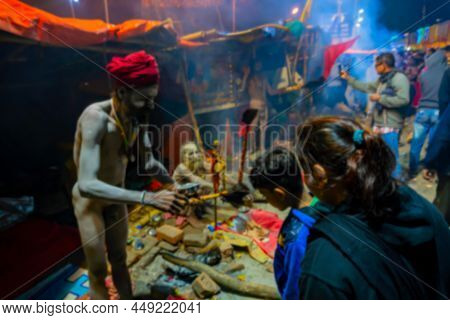Blurred Image Of Kolkata, West Bengal, India.hindu Sadhu Blessing Devotees At Gangasagar Transit Cam