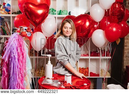 Woman With Composition Of White, Red, Foil Balloons In Form Of Heart And Ball.