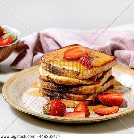 Stockpile Of French Toasts With Fresh Strawberries